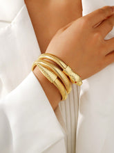 Pulseira feminina Cobra Entrelaçada – Dourado ou Prata | Estilo e Sofisticação